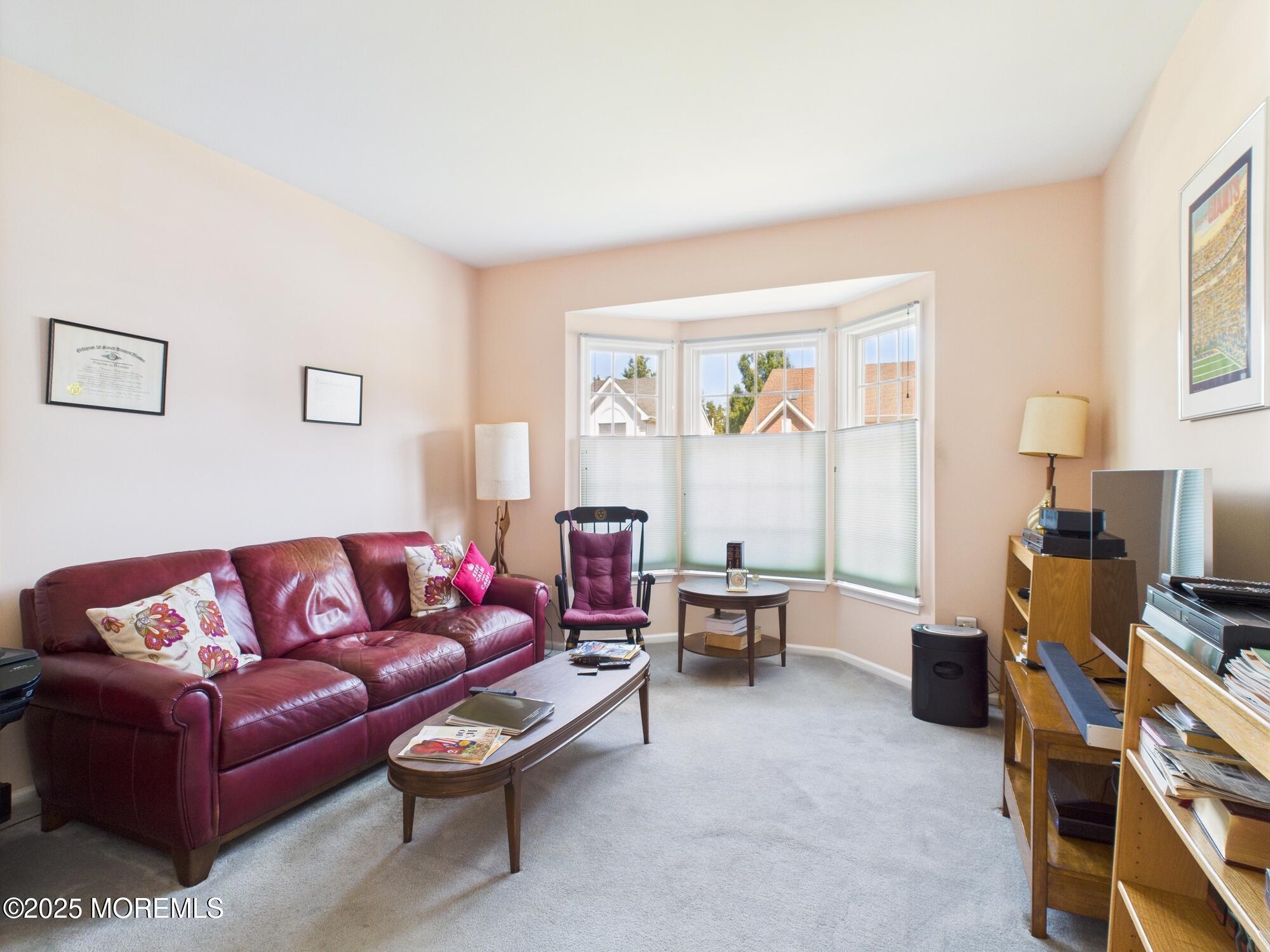 10 Windward Way Red Bank, NJ 07701 - Photo 9 of 31 a living room with furniture and a window