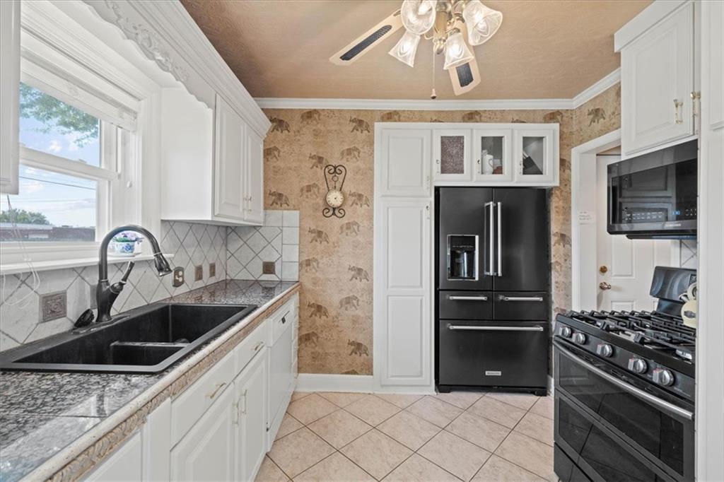 12910 Grandview Road Grandview, MO 64030 - Photo 18 of 39 Gallery Image 18