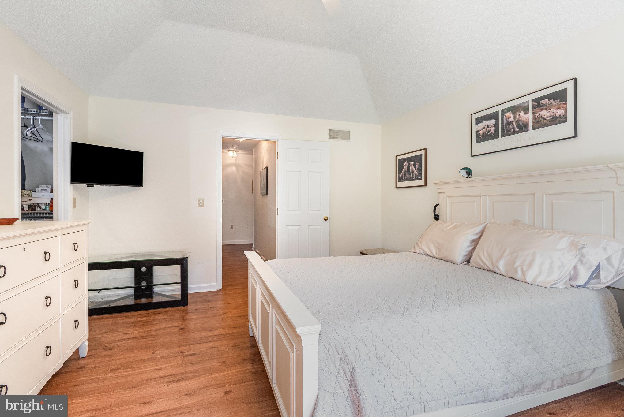 258 Bonnybrook Road Carlisle, PA 17015 - Photo 14 of 31 a bedroom with a bed and a flat screen tv