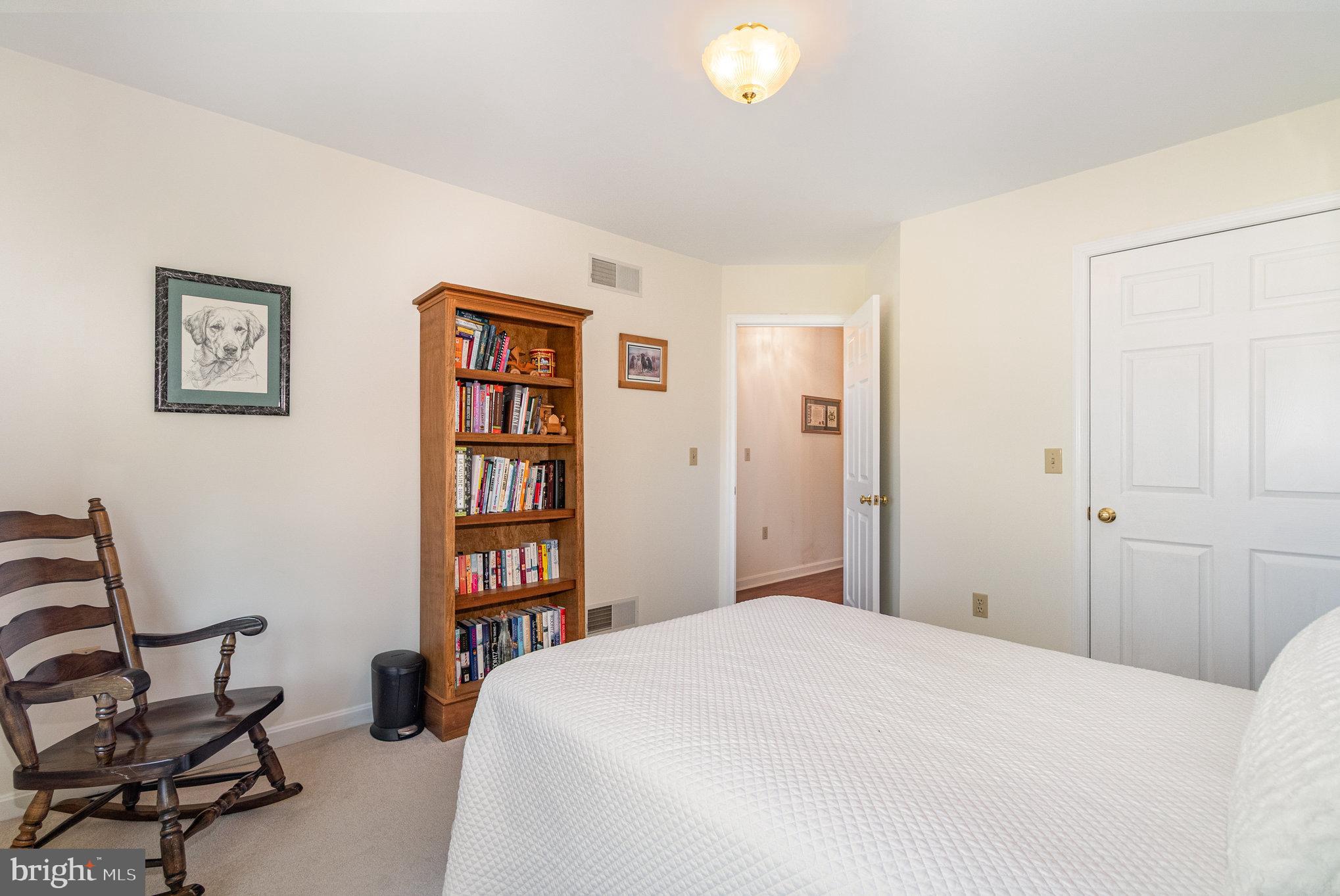258 Bonnybrook Road Carlisle, PA 17015 - Photo 20 of 31 a bedroom with a bed and a bookshelf