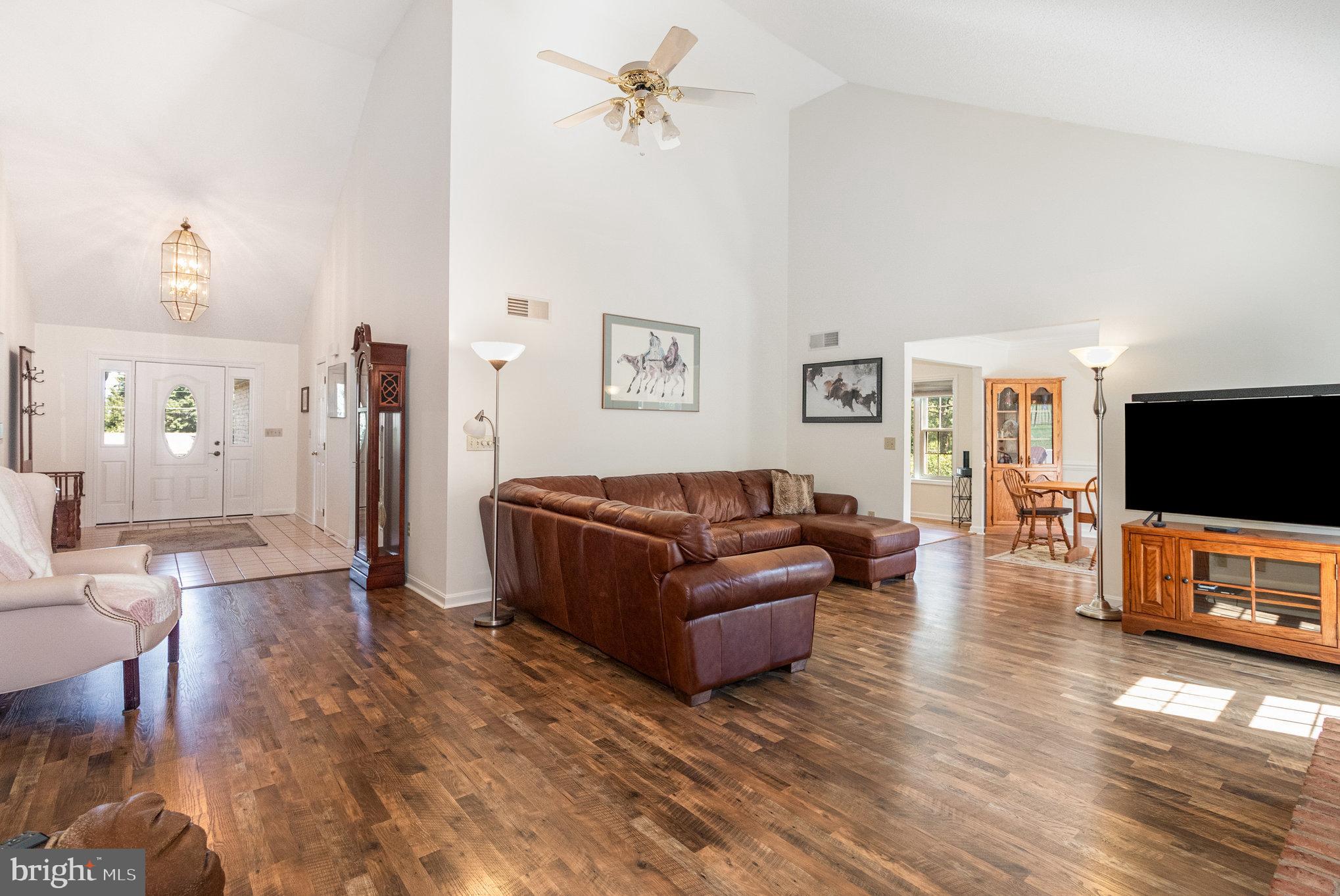 258 Bonnybrook Road Carlisle, PA 17015 - Photo 2 of 31 a living room with furniture and a flat screen tv