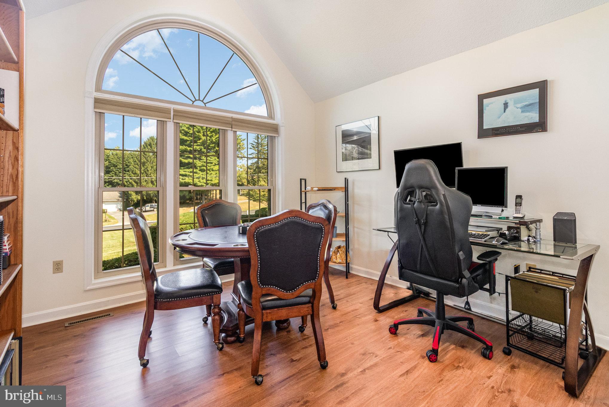 258 Bonnybrook Road Carlisle, PA 17015 - Photo 21 of 31 a view of a workspace with furniture and a window
