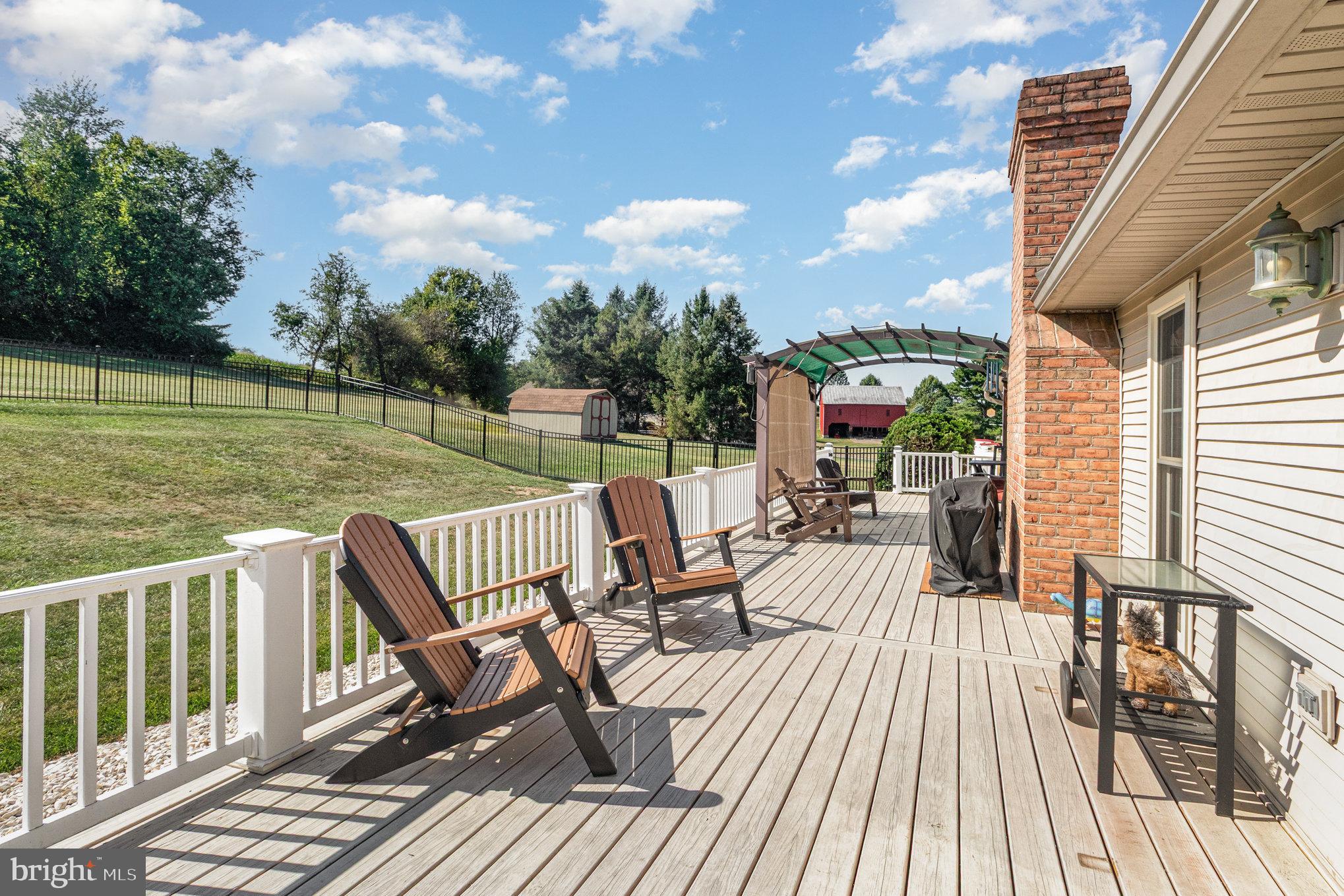 258 Bonnybrook Road Carlisle, PA 17015 - Photo 22 of 31 a view of a patio with two chairs and a table