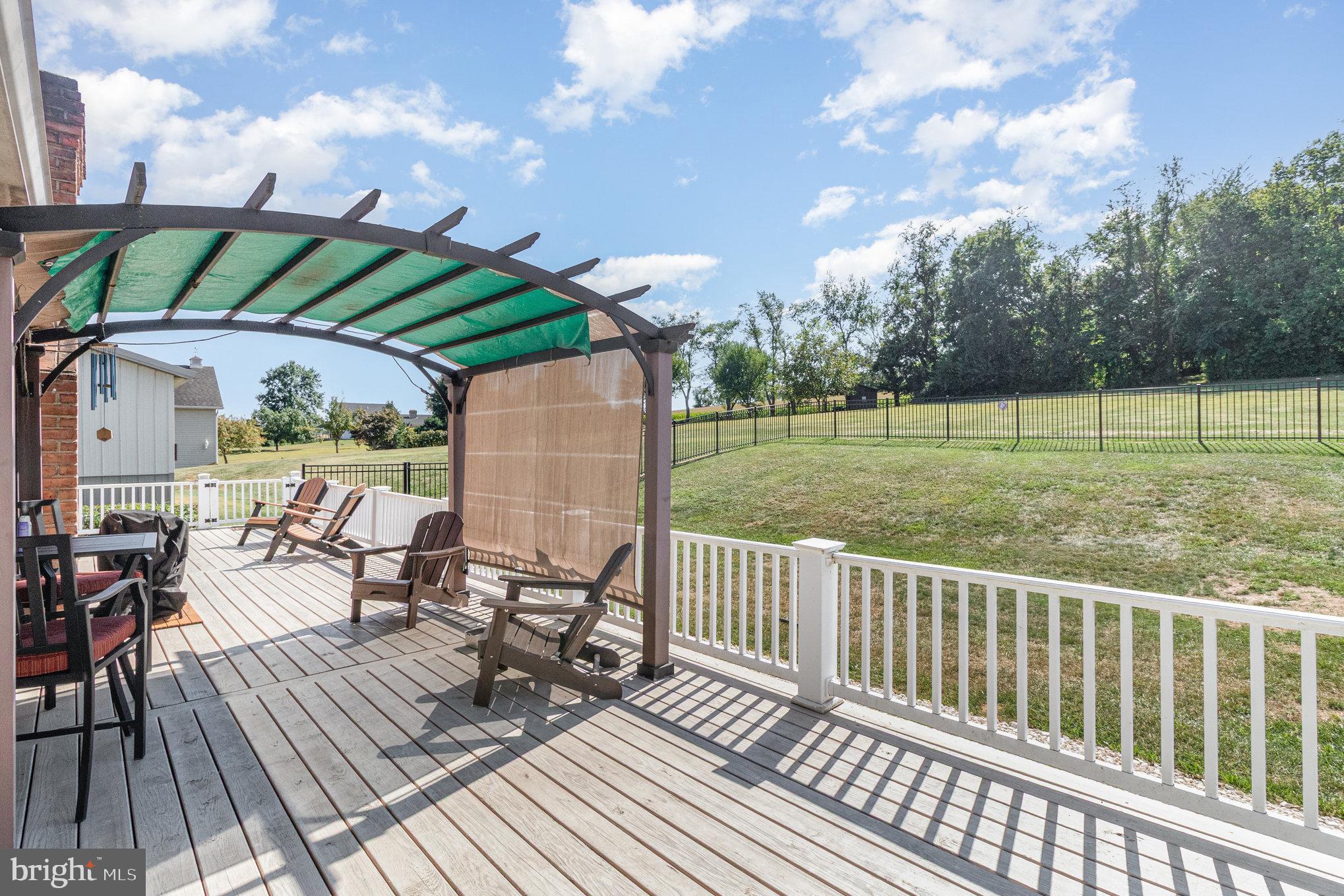 258 Bonnybrook Road Carlisle, PA 17015 - Photo 23 of 31 a view of a deck with chair and wooden floor