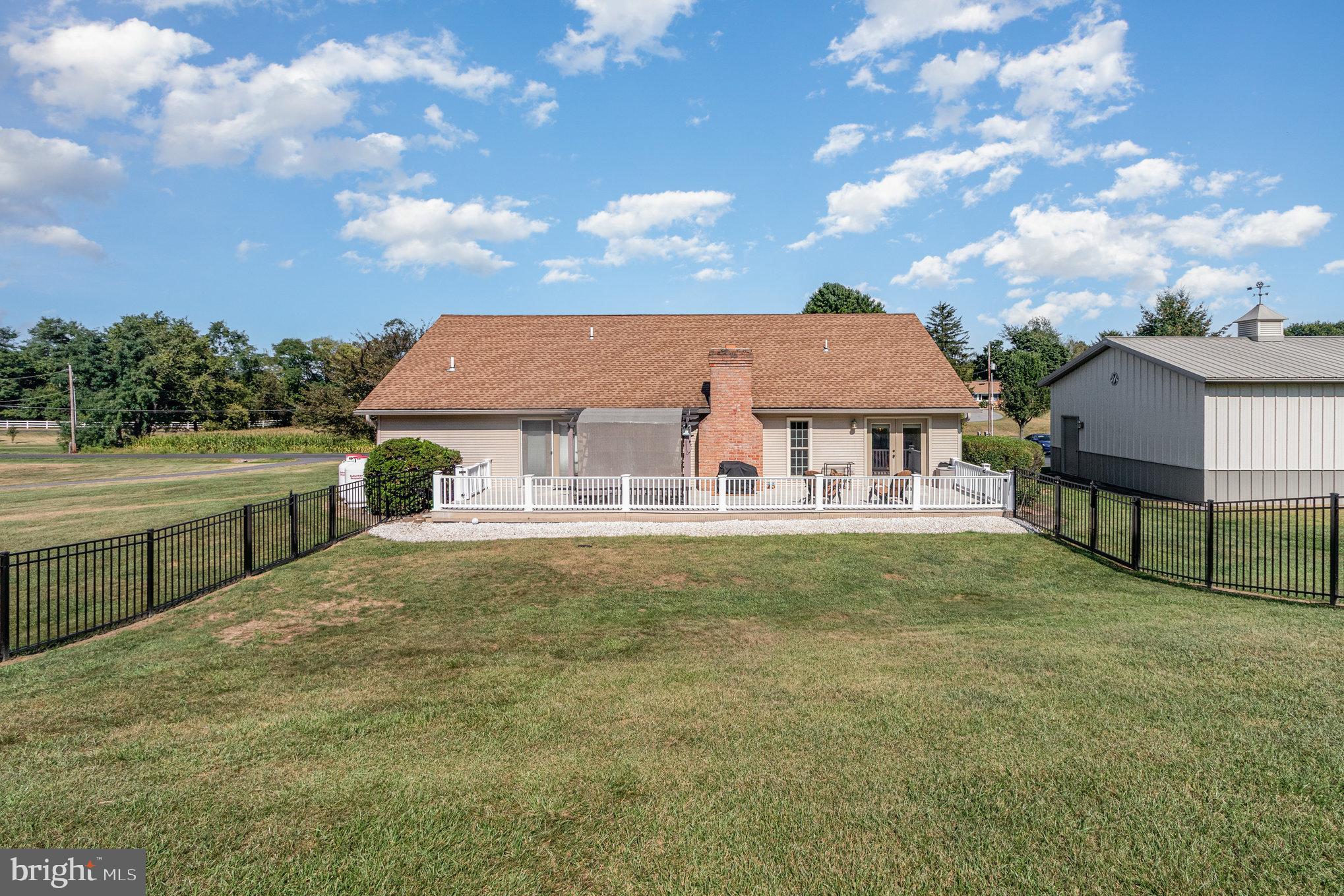 258 Bonnybrook Road Carlisle, PA 17015 - Photo 29 of 31 a front view of house with yard and car parked