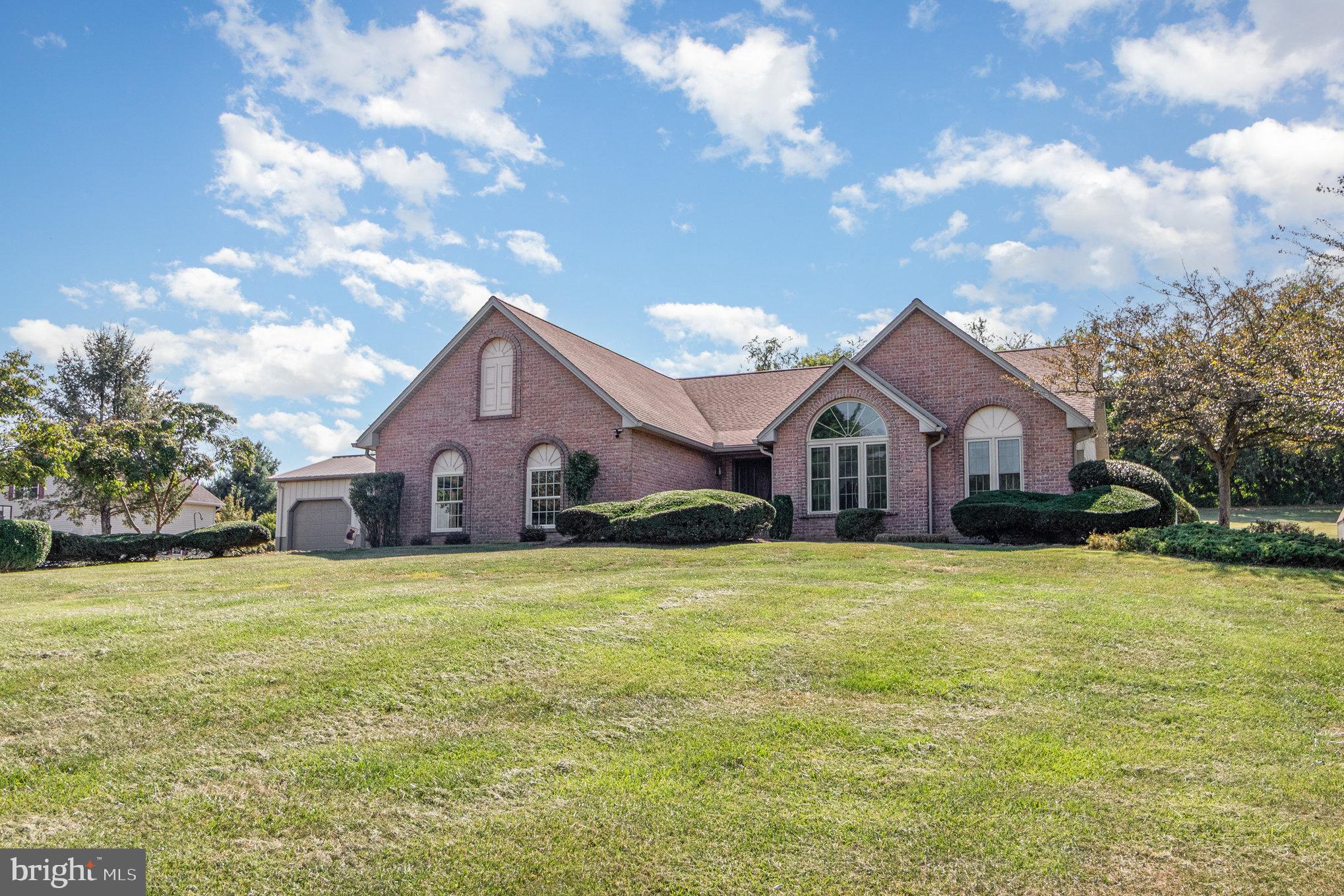258 Bonnybrook Road Carlisle, PA 17015 - Photo 31 of 31 a front view of a house with yard and large tree
