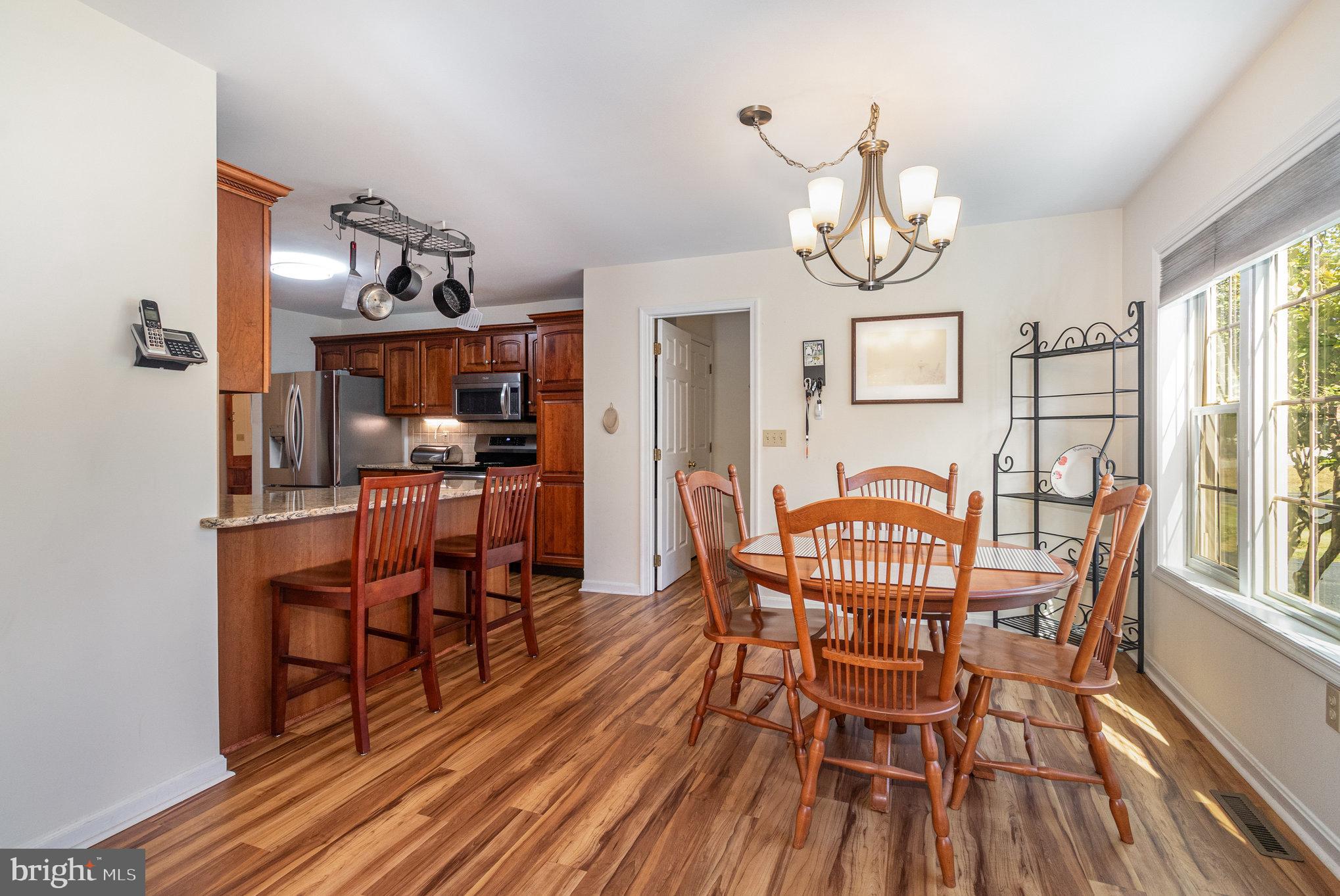 258 Bonnybrook Road Carlisle, PA 17015 - Photo 6 of 31 a view of a dining room with furniture large window and wooden floor