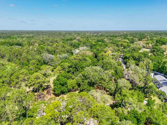 a view of a field with an outdoor space