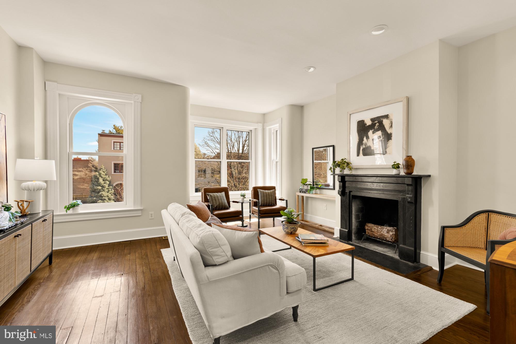 111 5th Street Southeast Washington, DC 20003 - Photo 17 of 42 Family room is bright and features a fireplace