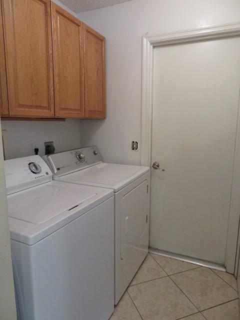 274 Southwest Ray Avenue Port St. Lucie, FL 34983 - Photo 12 of 18 Laundry Room