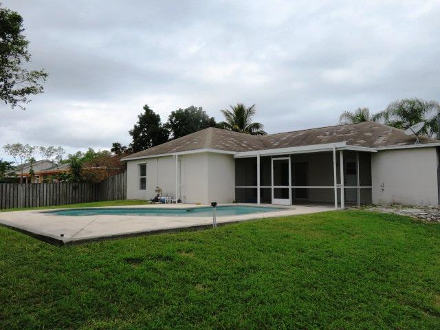 274 Southwest Ray Avenue Port St. Lucie, FL 34983 - Photo 17 of 18 Back yard 1