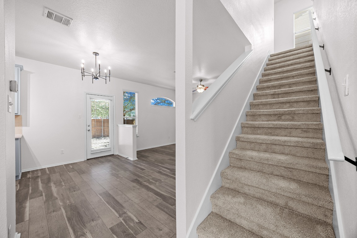 10208 Laredo Drive, Unit 105 Austin, TX 78748 - Photo 11 of 37 a view of an entryway with wooden floor