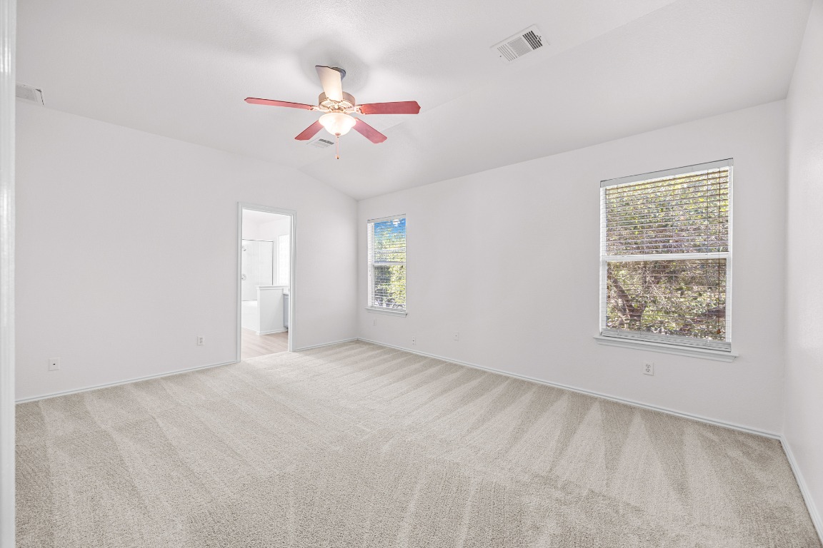 10208 Laredo Drive, Unit 105 Austin, TX 78748 - Photo 22 of 37 a view of an empty room with a window