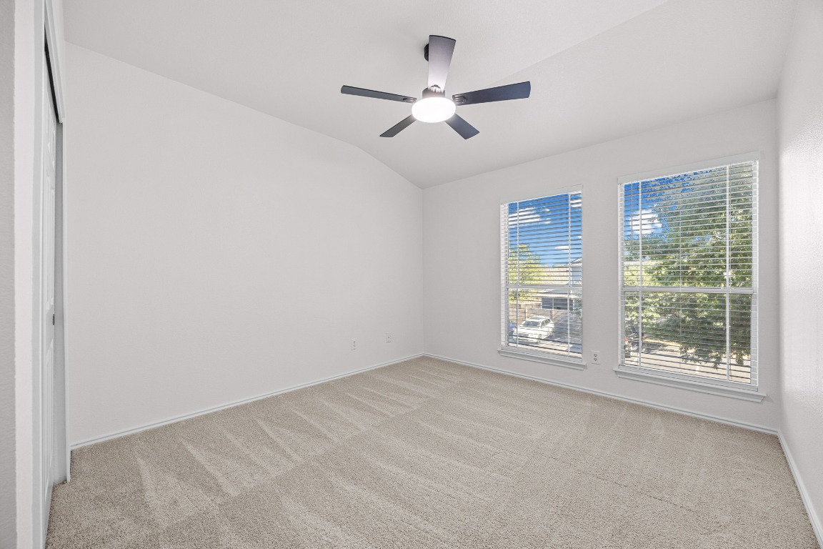 10208 Laredo Drive, Unit 105 Austin, TX 78748 - Photo 29 of 37 a view of an empty room with a window