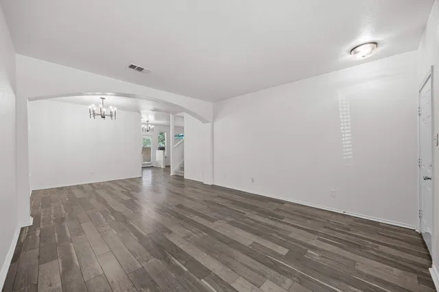 a view of a livingroom with wooden floor