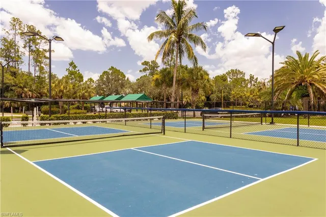 a view of dining room with a hallway
