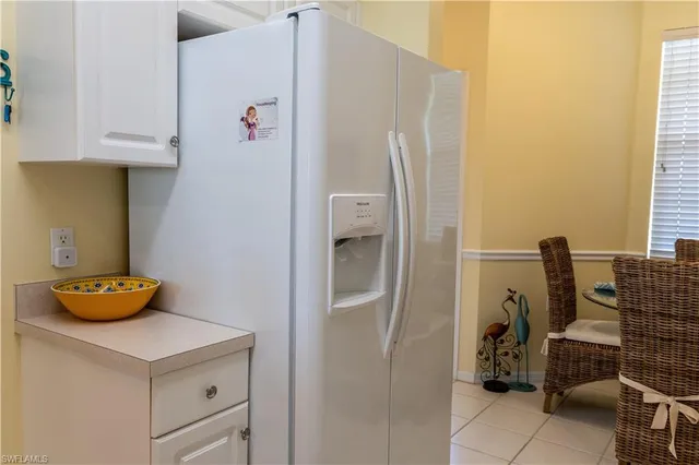 a kitchen with a sink and a window