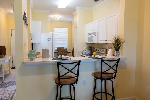 a table and chairs in a kitchen