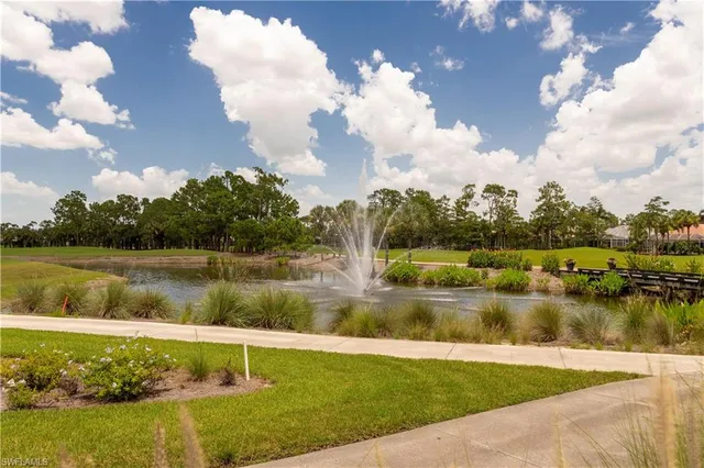 a view of a patio with a dining table and chairs with a patio