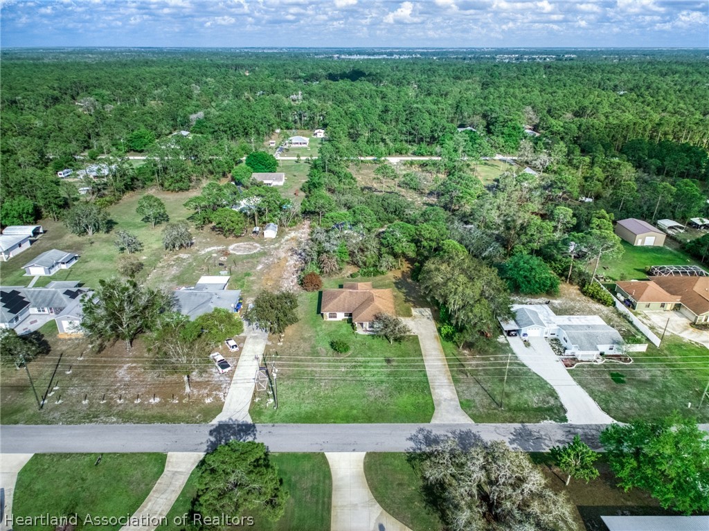 5802 Golden Road Sebring, FL 33875 - Photo 35 of 37 a view of a garden with a building