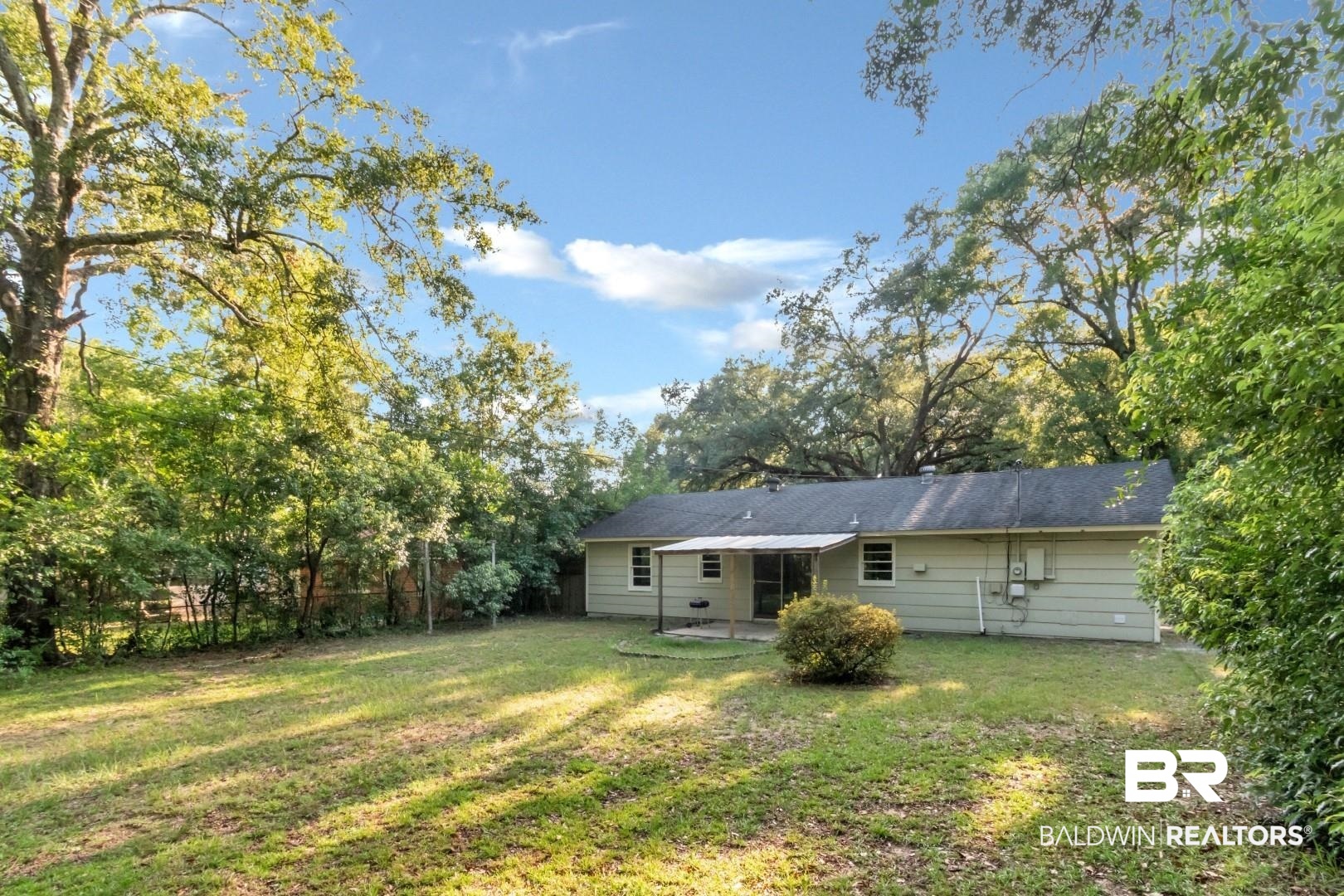 1220 Garland Drive Mobile, AL 36618 - Photo 25 of 25 Rear view of property with a yard