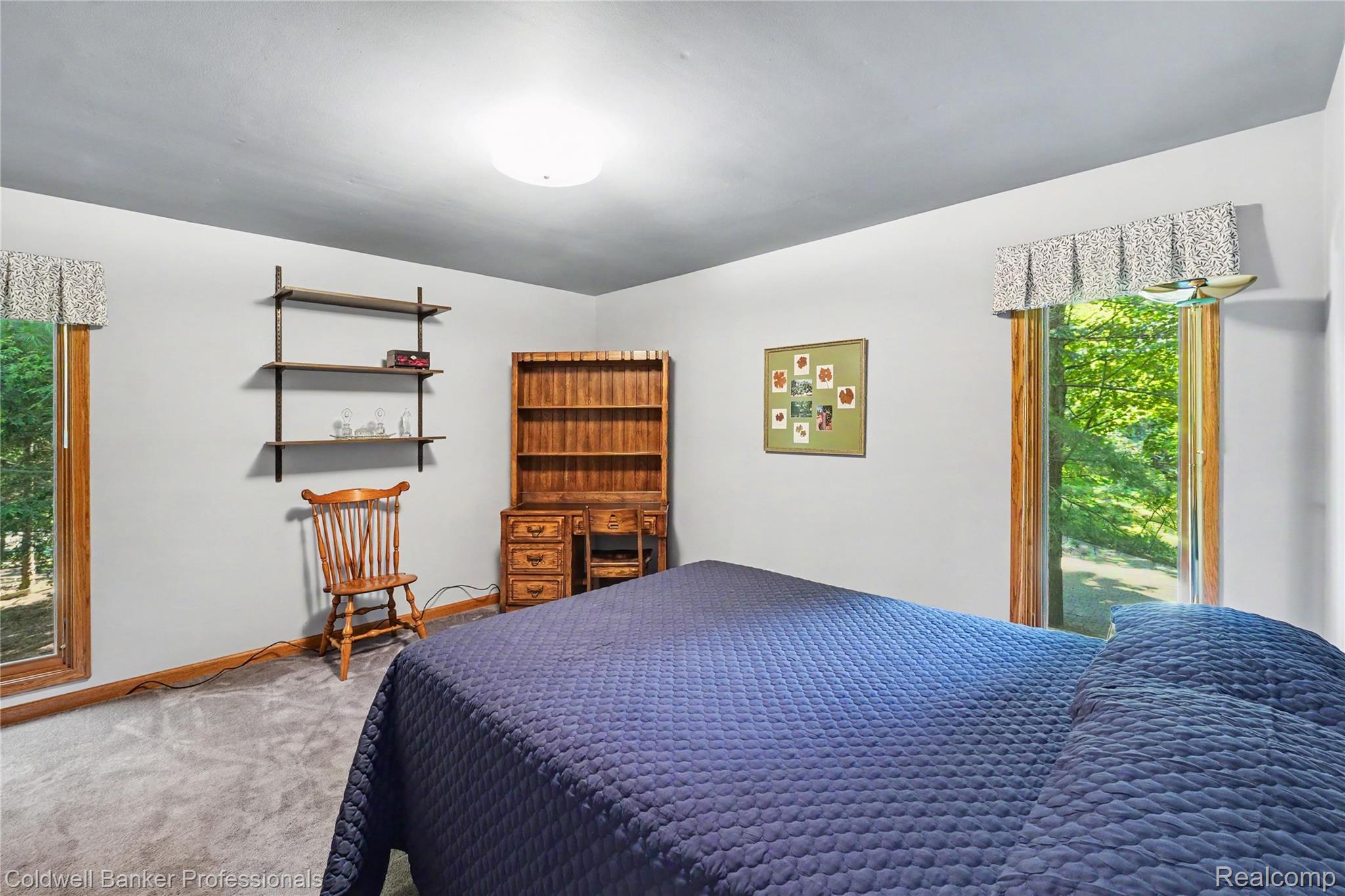3583 Mitchell Road Metamora, MI 48455 - Photo 37 of 58 Carpeted interior room featuring light gray walls and a ceiling light fixture