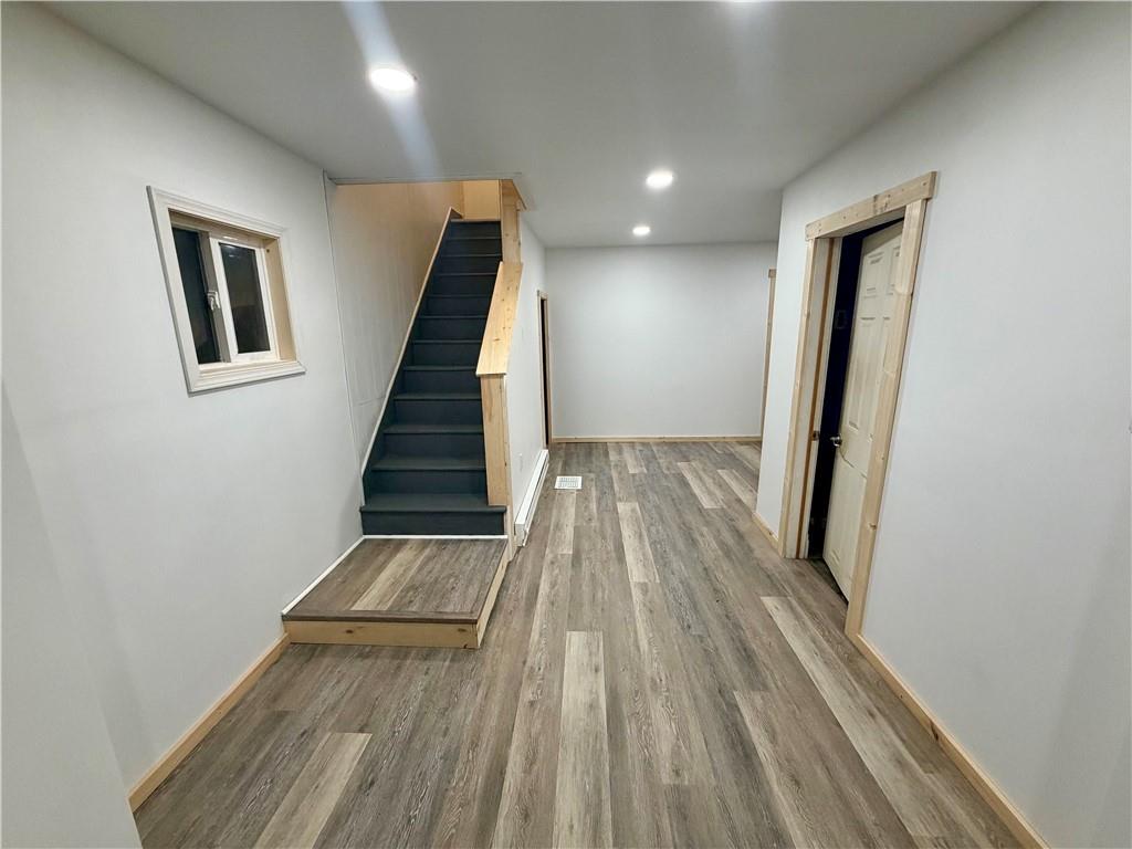 1010 Kiester Road Slippery Rock, PA 16057 - Photo 10 of 21 a view of a hallway with wooden floor and staircase