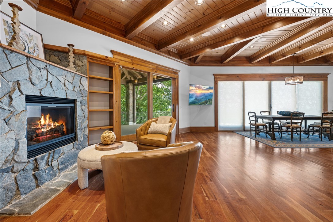 171 Acanthus Trail Boone, NC 28607 - Photo 12 of 49 a living room with fireplace furniture and a flat screen tv