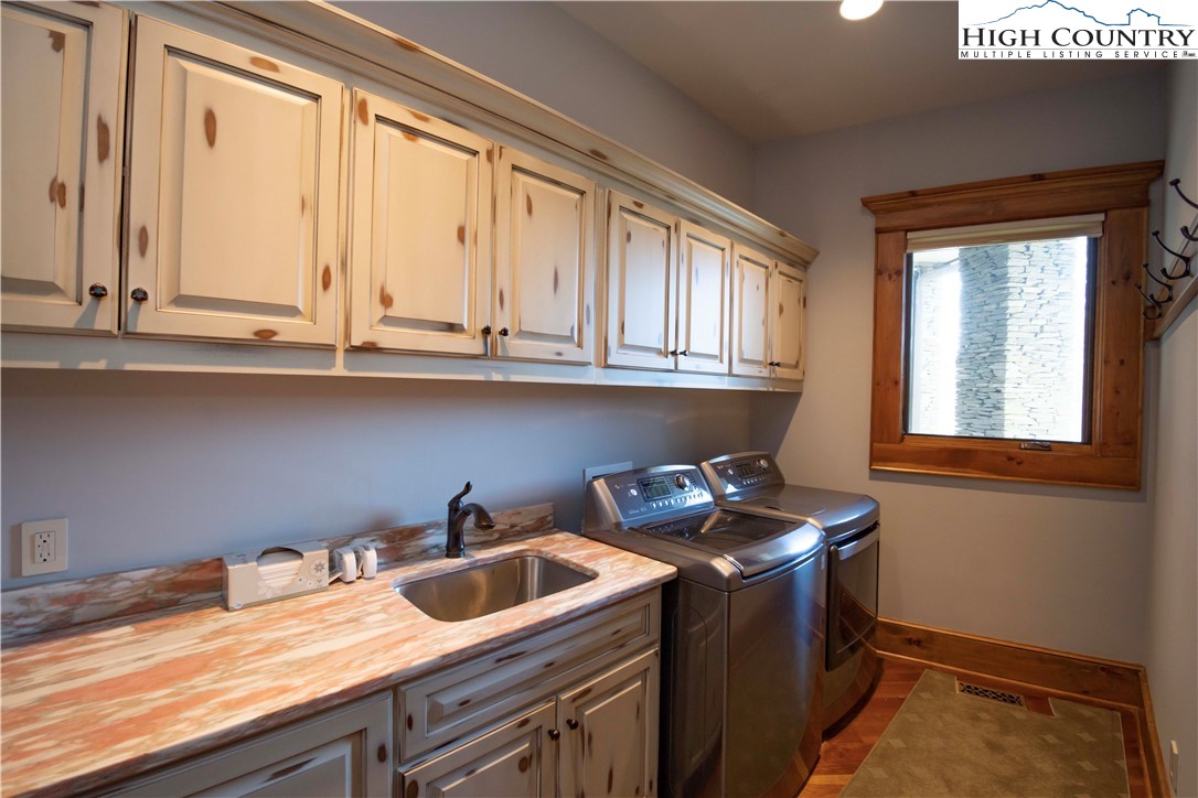 171 Acanthus Trail Boone, NC 28607 - Photo 21 of 49 a kitchen with granite countertop cabinets sink and window