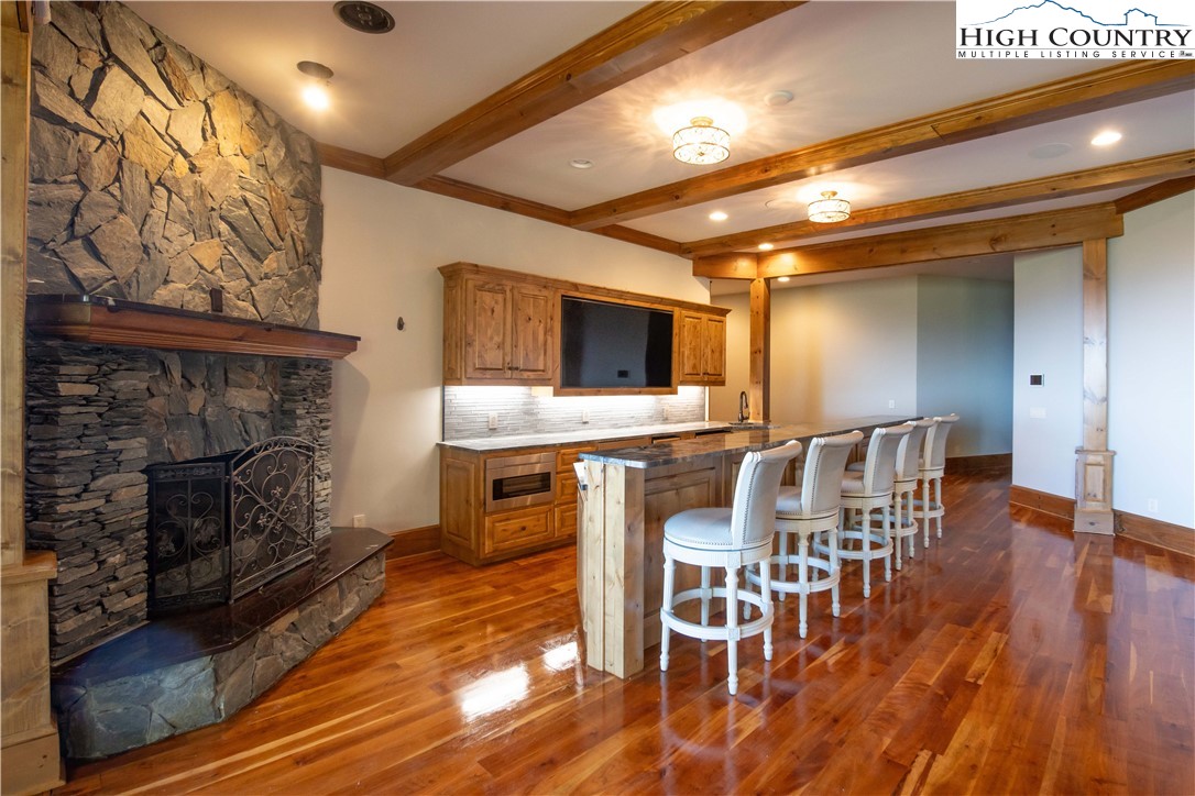 171 Acanthus Trail Boone, NC 28607 - Photo 24 of 49 a view of a livingroom with furniture and a fireplace