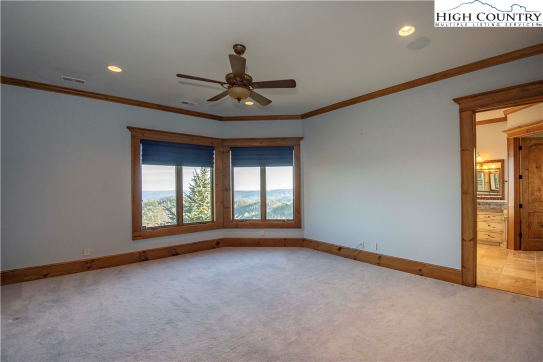 171 Acanthus Trail Boone, NC 28607 - Photo 30 of 49 a view of room with a ceiling fan and window