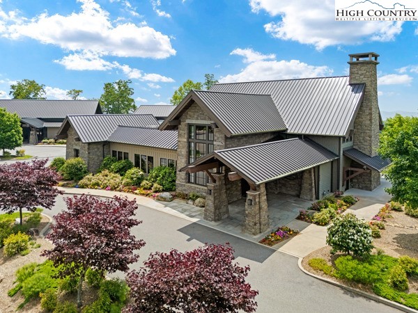 171 Acanthus Trail Boone, NC 28607 - Photo 37 of 49 a front view of a house with a garden