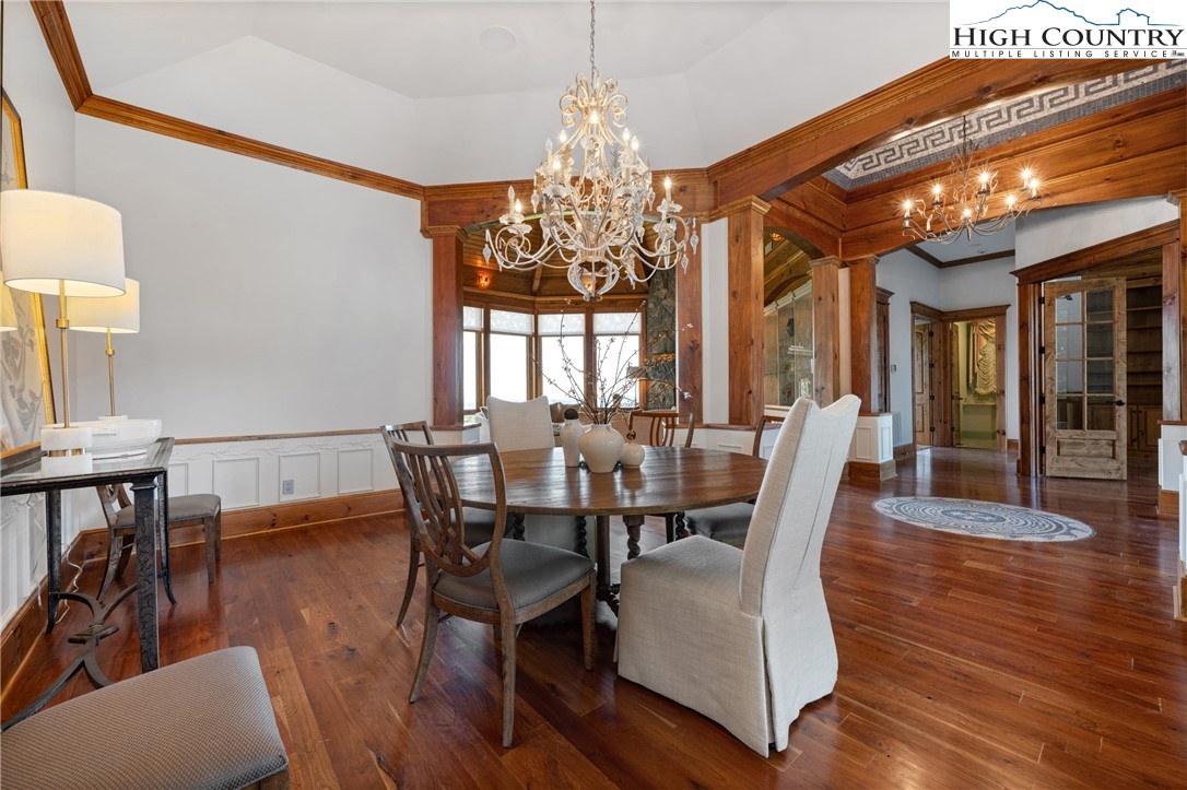 171 Acanthus Trail Boone, NC 28607 - Photo 6 of 49 a view of a dining room with furniture window and wooden floor