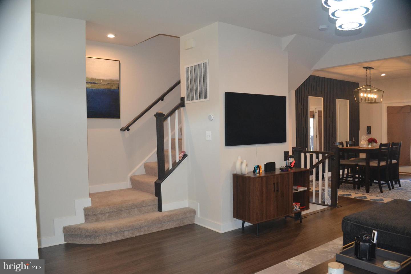 1015 Rampart Drive Fredericksburg, VA 22401 - Photo 15 of 37 a living room with furniture and a flat screen tv