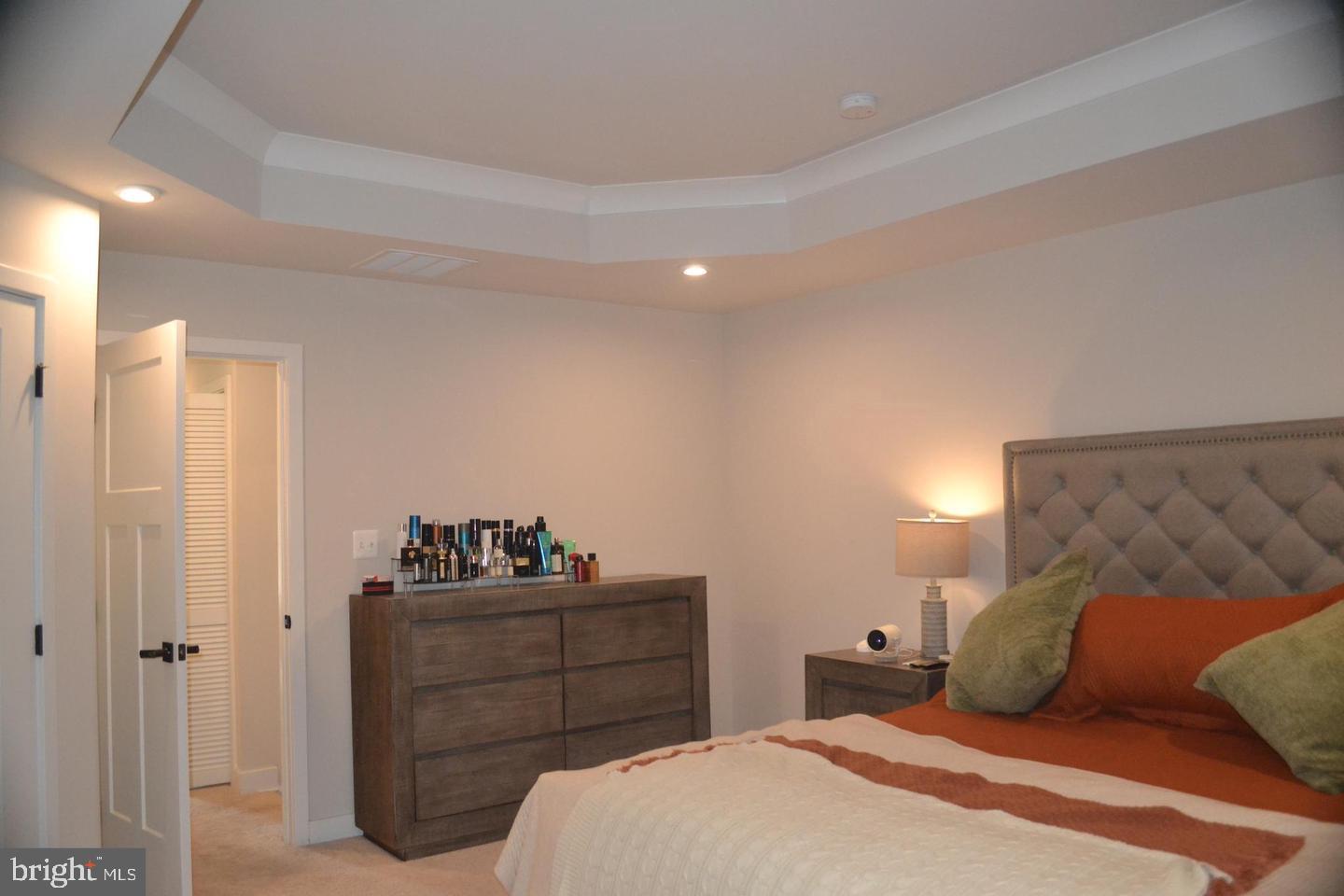 1015 Rampart Drive Fredericksburg, VA 22401 - Photo 16 of 37 a bedroom with a bed and cabinet
