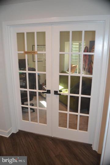 1015 Rampart Drive Fredericksburg, VA 22401 - Photo 32 of 37 a view of an empty room with wooden floor and windows