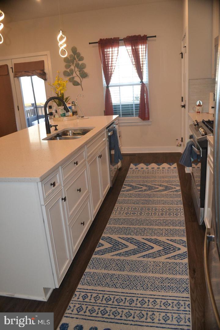1015 Rampart Drive Fredericksburg, VA 22401 - Photo 10 of 37 a bathroom with a double vanity sink and a mirror