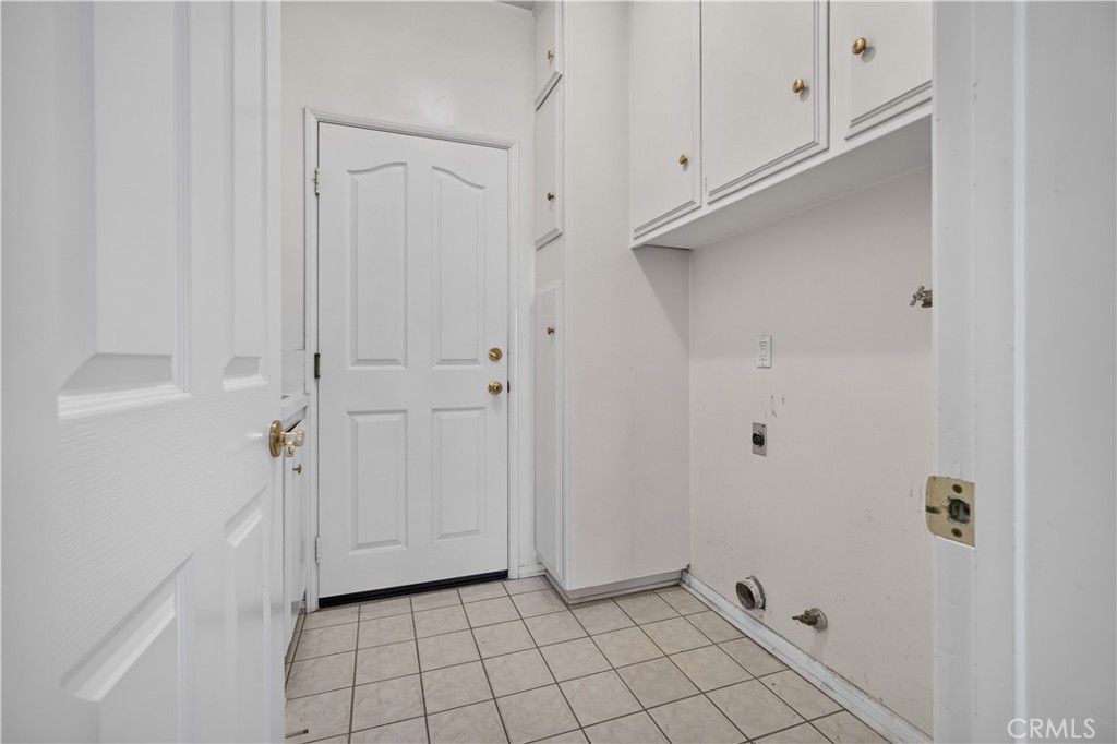 11719 Monte Leon Way Porter Ranch, CA 91326 - Photo 27 of 56 laundry room