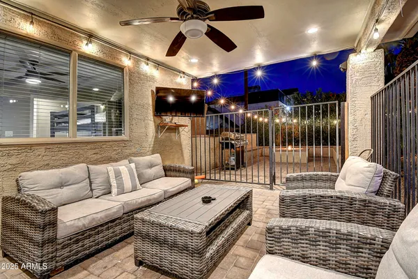 a living room with furniture and a table
