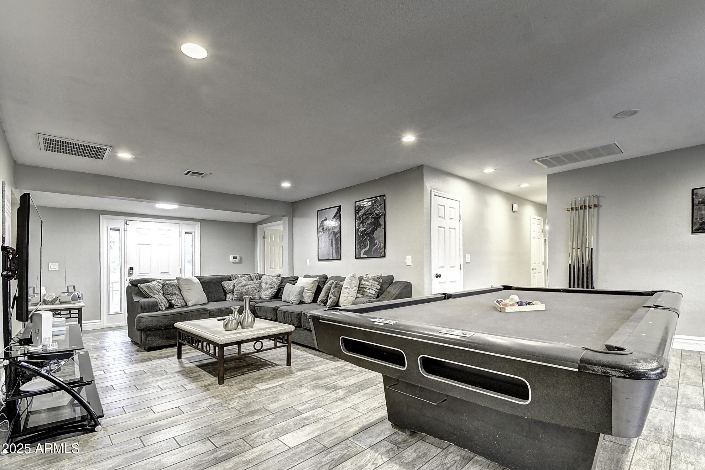 4101 East Nisbet Road Phoenix, AZ 85032 - Photo 25 of 64 a living room with stainless steel appliances furniture a rug and a window