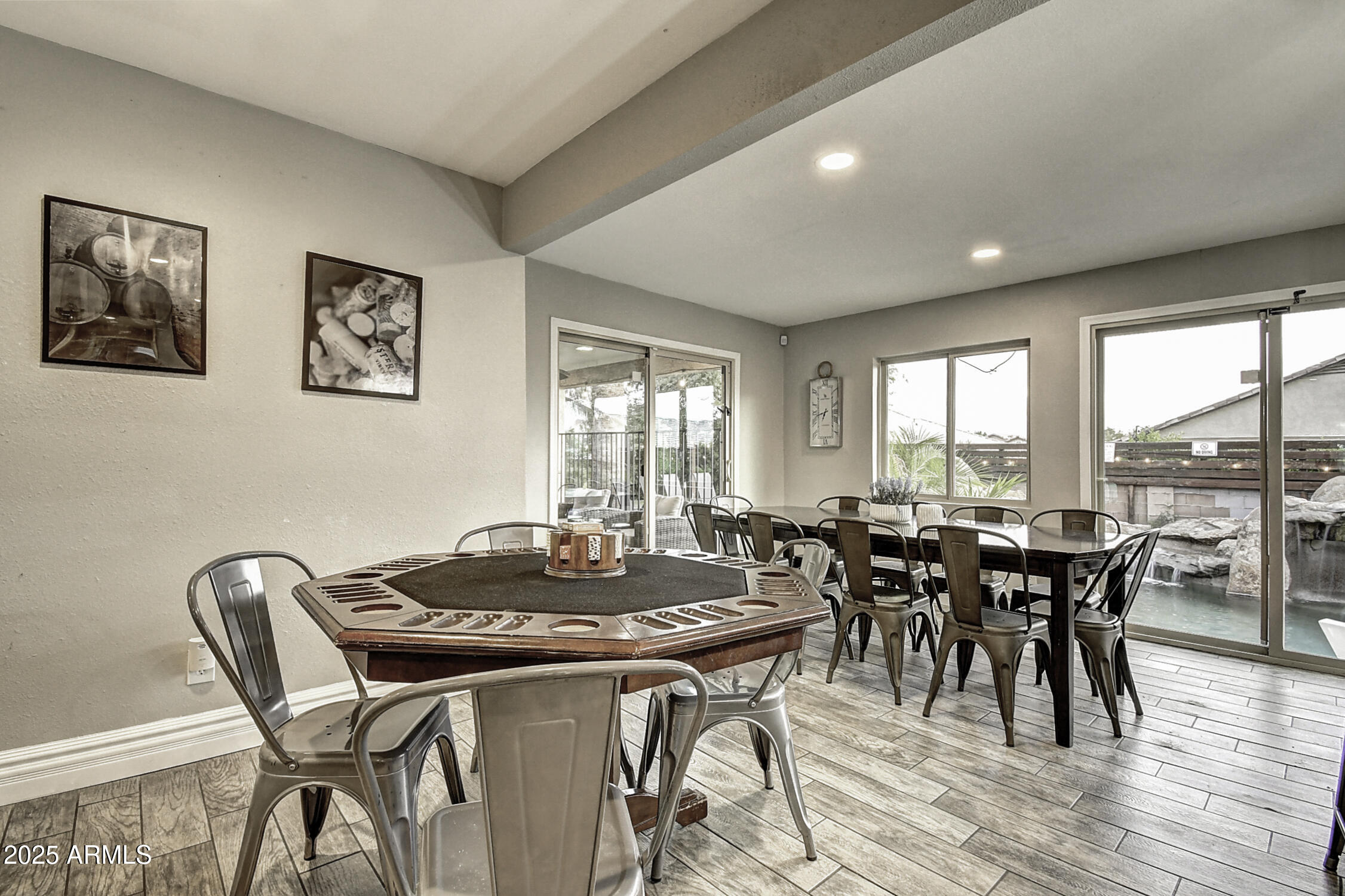 4101 East Nisbet Road Phoenix, AZ 85032 - Photo 27 of 64 a view of a dining room with furniture window and wooden floor