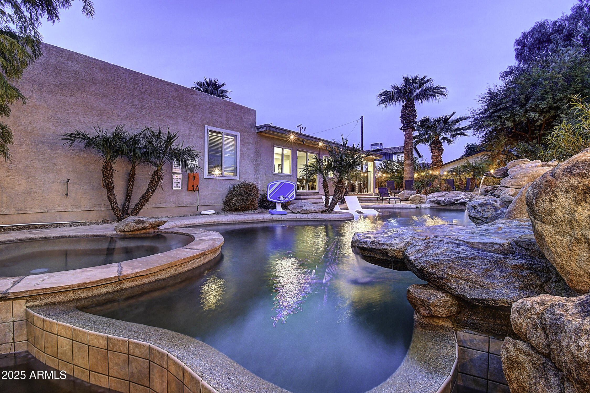 4101 East Nisbet Road Phoenix, AZ 85032 - Photo 3 of 64 a view of a swimming pool with outdoor seating
