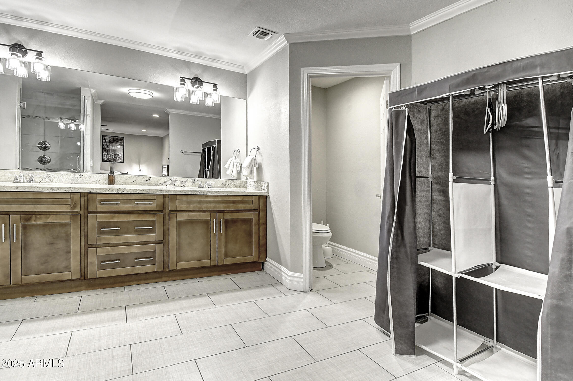 4101 East Nisbet Road Phoenix, AZ 85032 - Photo 39 of 64 a bathroom with a sink a toilet and shower