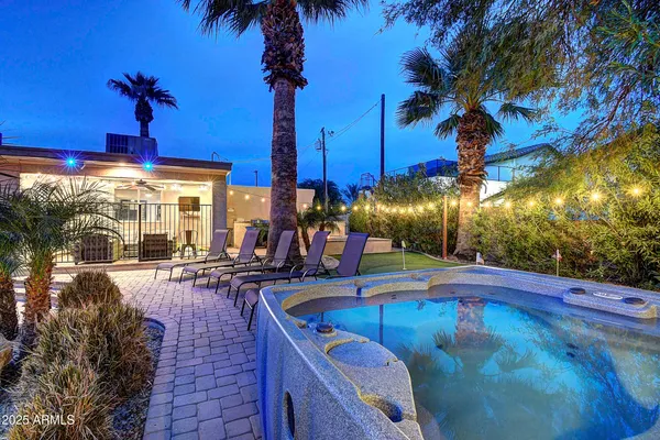 a view of a patio with swimming pool