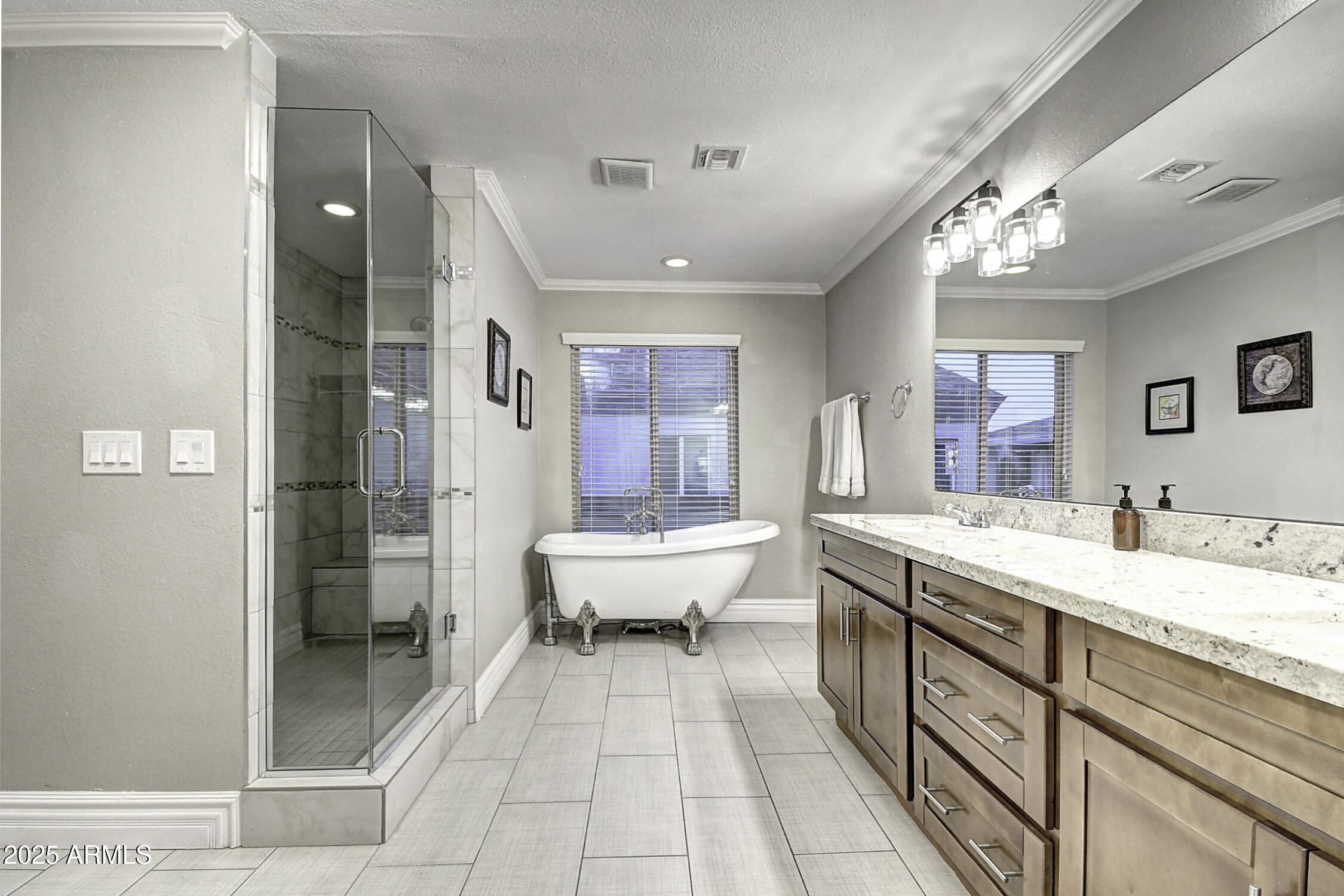 4101 East Nisbet Road Phoenix, AZ 85032 - Photo 41 of 64 a spacious bathroom with a tub sink and shower