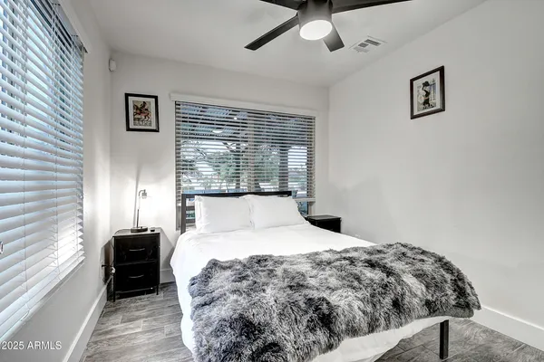 a view of a chairs and tables in patio
