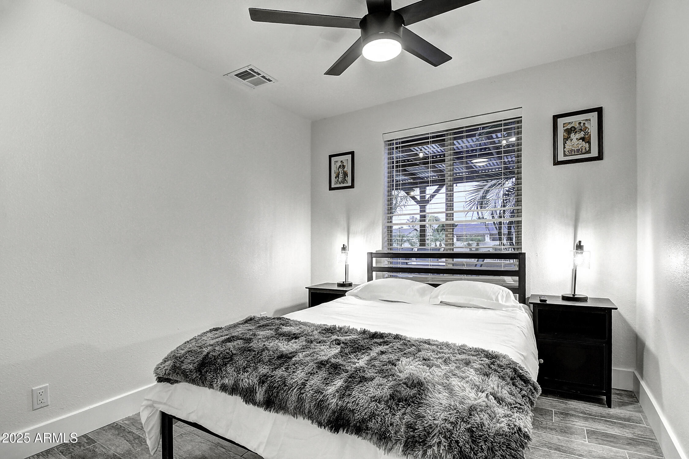 4101 East Nisbet Road Phoenix, AZ 85032 - Photo 51 of 64 a bedroom with a bed and a window