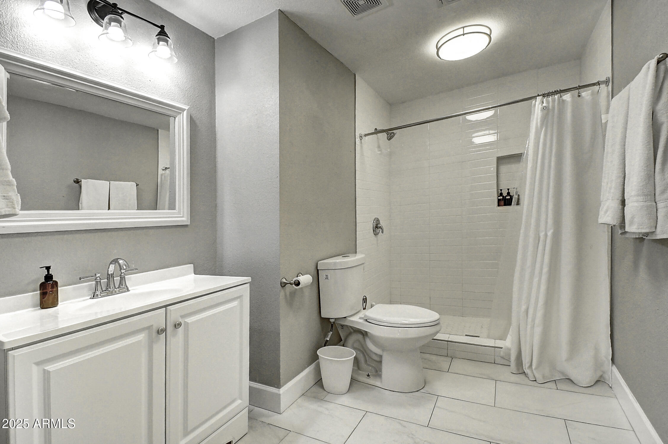 4101 East Nisbet Road Phoenix, AZ 85032 - Photo 63 of 64 a bathroom with a sink toilet and shower