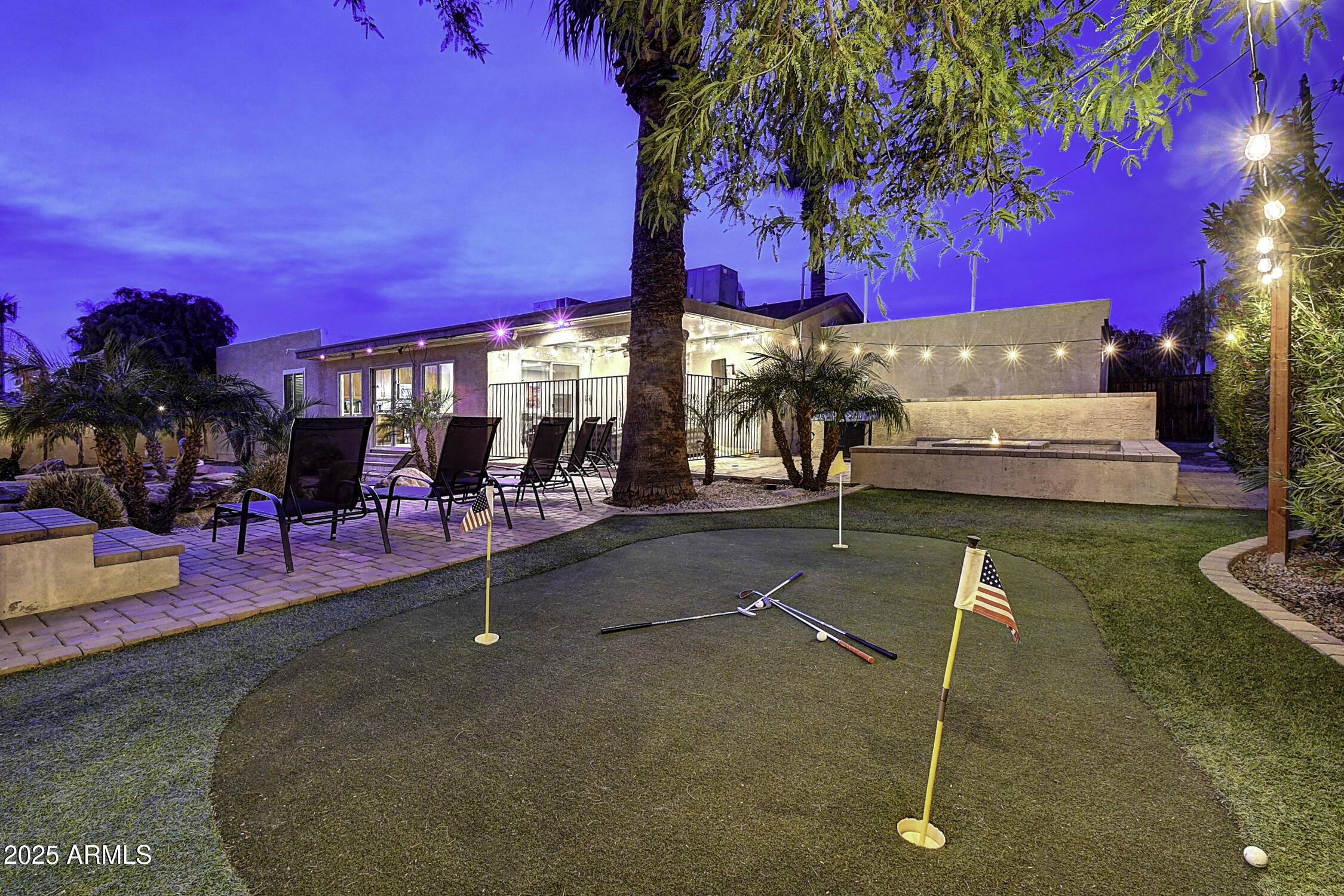 4101 East Nisbet Road Phoenix, AZ 85032 - Photo 8 of 64 a view of a swimming pool with outdoor seating