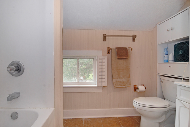 128 Howard Street Geneva, IL 60134 - Photo 15 of 29 a bathroom with a sink a toilet and shower